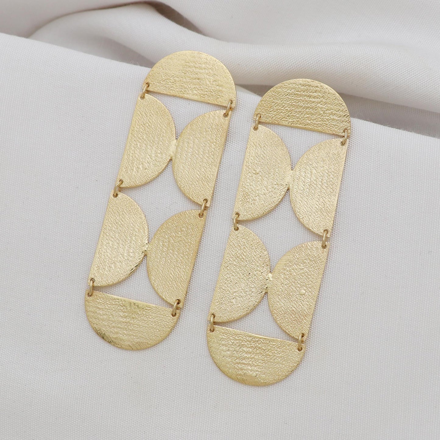 Gold plated brass long designer earrings with shiny brushed texture , Party wear earrings